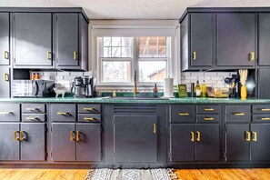 private vacation rentals
Our kitchen is equipped with a Frigidaire refrigerator, electric stove, single oven, and dishwasher. It comes fully stocked with cooking essentials like pots, pans, and spices. With a spacious dining table and multiple coffee maker options, it’s a dream come true for any chef