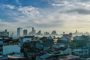 Sunset kissing the skyscrapers of the new City from the view of the old city 