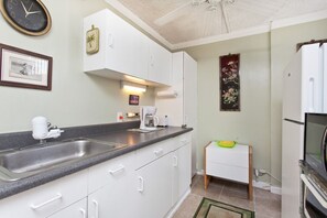 Well stocked kitchenette with Apartment size Fridge / Freezer