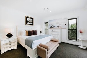 The sumptuous master bedroom comes with a king-sized bed, walk-in wardrobe and sleek ensuite bathroom.
