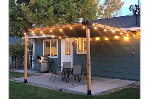 Great outdoor patio for enjoying the backyard and grilling.