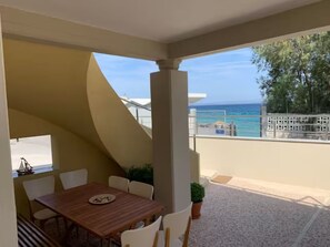 View from the front yard shows the private entrance to the beach.