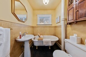 the upstairs bathroom features the original clawfoot tub