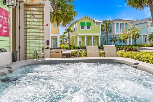 Outdoor Back Patio Area -- *Jacuzzi Tub, Patio Table+ Sun Loungers* - After a busy day, this jacuzzi tub is the best place to relax at the outdoor back patio area.