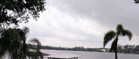 Lake view from the deck off bedroom . Beach area and dock. 