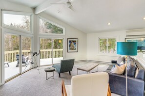 Living Room | 3rd Floor | King Sleeper Sofa | Wood-Burning Stove | Books