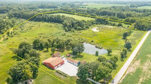 Guests can enjoy the properties 45 acres of open fields, wetlands, pond, trails and wooded area