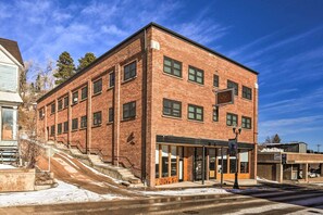 Building Exterior | Community Parking Lot (1 Vehicle) | Public Garage Next Door