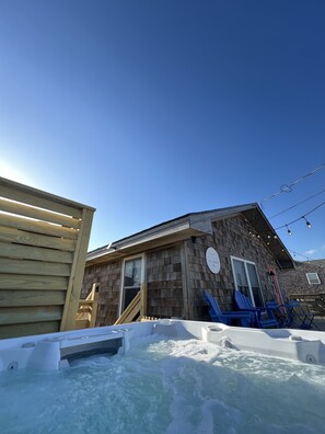 The perfect hot tub on our deck, right next to the outdoor shower!