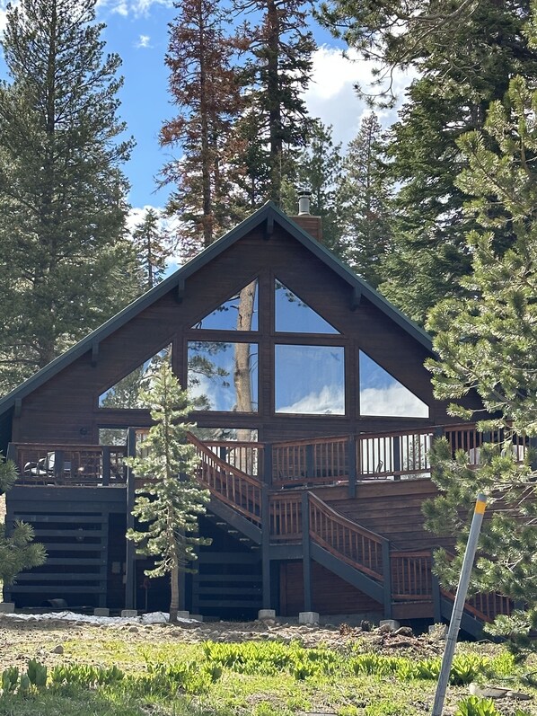 View of front of chalet from street. Taken in June. 