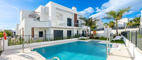 Rent this Holiday townhouse with communal pool, solarium, sea view