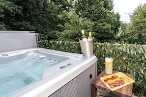 Relax in the hot tub with wine and snacks :)