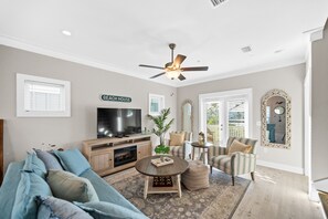 Cozy living room with access to covered deck. Sleeper sofa. Games. TV