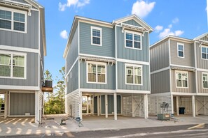 Beach house with parking for 3 cars underneath