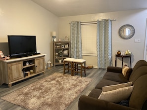 Sit back, make memories, play games and laugh in this warm and cozy living room!