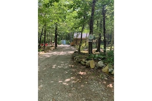 The driveway leading into the cabin