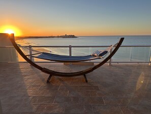 Relax in the hammock on the huge patio!!