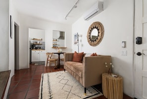 Living room blends modern aesthetics with comfort.