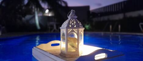 Enjoy romantic evenings by the pool.