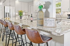 Beautiful kitchen with island that seats 6. 