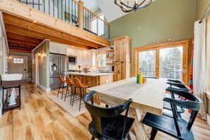 Dining area looking into the kitchen with access to the Deck.