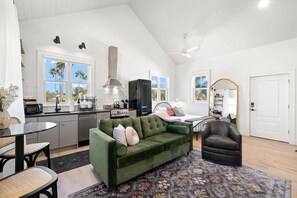 Living Area with Queen Sized Pull-Out Couch and Breakfast Bar