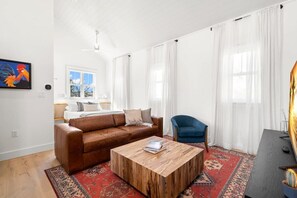 Eclectic Living Area with Queen Sized Pull-Out Couch