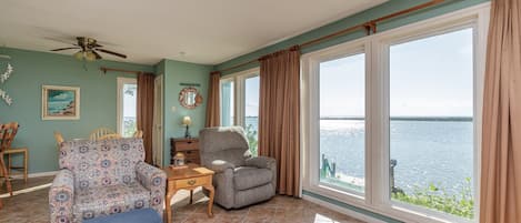 Living area with bright light shinning in, great space to relax