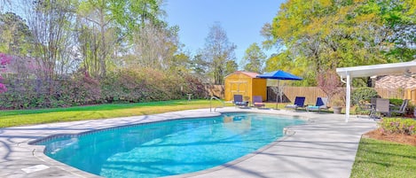 Private pool in large fenced backyard