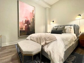 Aside from the bedroom's inviting style, the mattress is an Avocado Organic 10 inch memory foam and the Brooklinen thread count is 300+. You will be just fine!