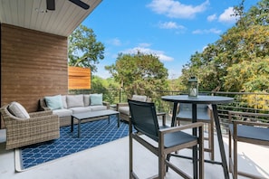 Outdoor balcony with Comal River views