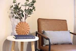 A stylish corner perfect for reading or sipping coffee—thoughtfully designed for comfort.