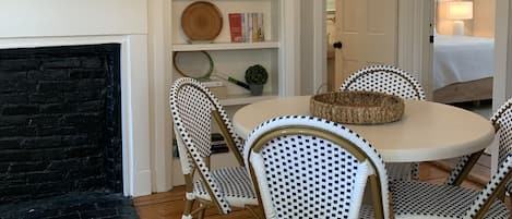 Dining room with building book shelves with lots of good Summer reads :)