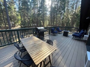 The spacious upper deck is perfect for cooking on the bbq, enjoying the gas fireplace, or just enjoying your morning cup of coffee. 