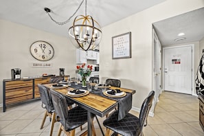  Gather your loved ones around this charmingly rustic dining table and feast to your heart's content! With ample space and cozy seating, this table is the perfect spot for creating enduring memories and bonding with your family. 