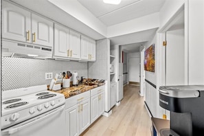 We have a full kitchen for you make a home cooked meal including spices