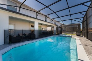 Pool area with child safety fence up.