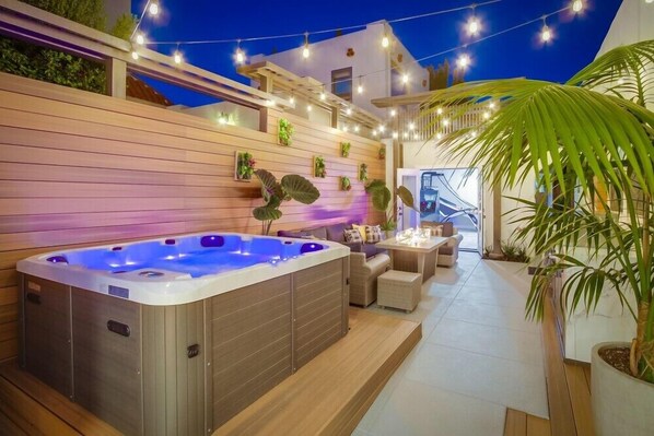 Immerse yourself in rejuvenating relaxation with your own private hot tub