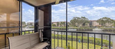 Private balcony overlooking the peaceful canal and docks