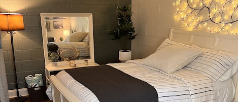 Enjoy our comfy European bedding and large screen TV