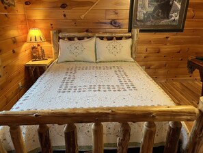 Queen bed in the loft bedroom