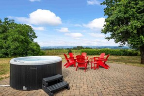 The hot tub is a favorite amenity perfect during warm summers and chilly winters.  It has a great view of the countryside.