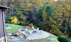 Large fire pit beside the house to enjoy evening company. 