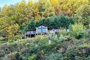 Exterior of cabin October 24, 2024 showing start of fall colors