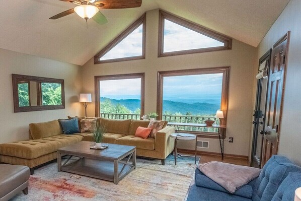 Main floor living room. On a clear day, you can see 70 miles or more. The three king bedrooms are all on this level.