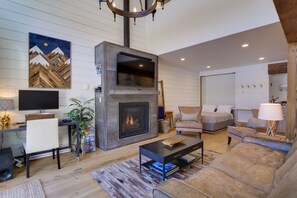 Living Room | Fireplace | Workstation | Murphy Bed | Private Patio