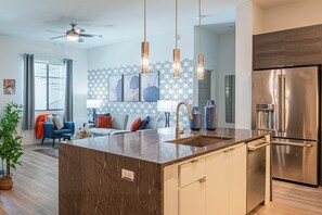 Modern appliances and sleek countertops for easy meal prep.