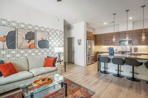 Bright, open-concept living room with cozy seating for everyone