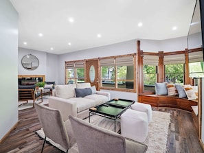 There is a lot of space for your whole group to hang out and enjoy the time together! Plenty of seating in the living room to take in the natural light views and watch a movie or show