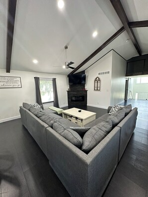 Living Room- Smart TV, Gas Fireplace, & Board Games.